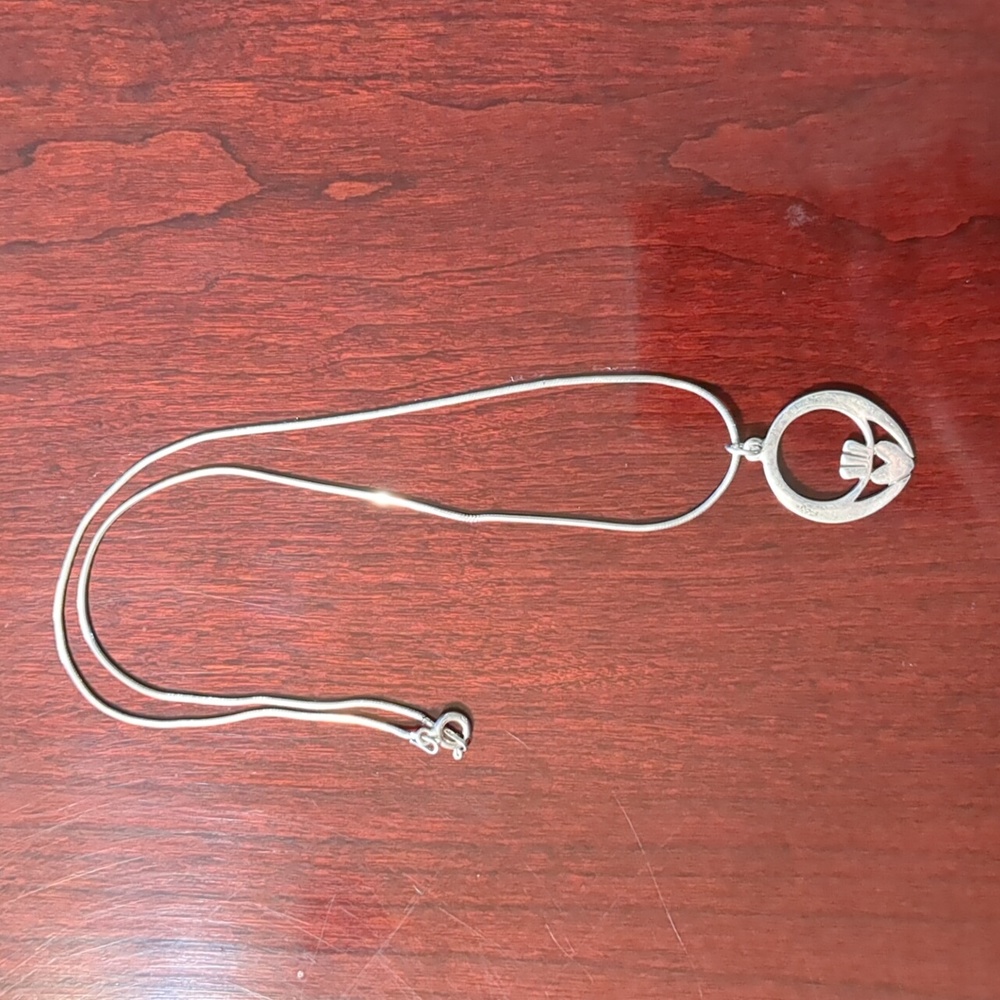 millennial Claddagh pendant necklace.